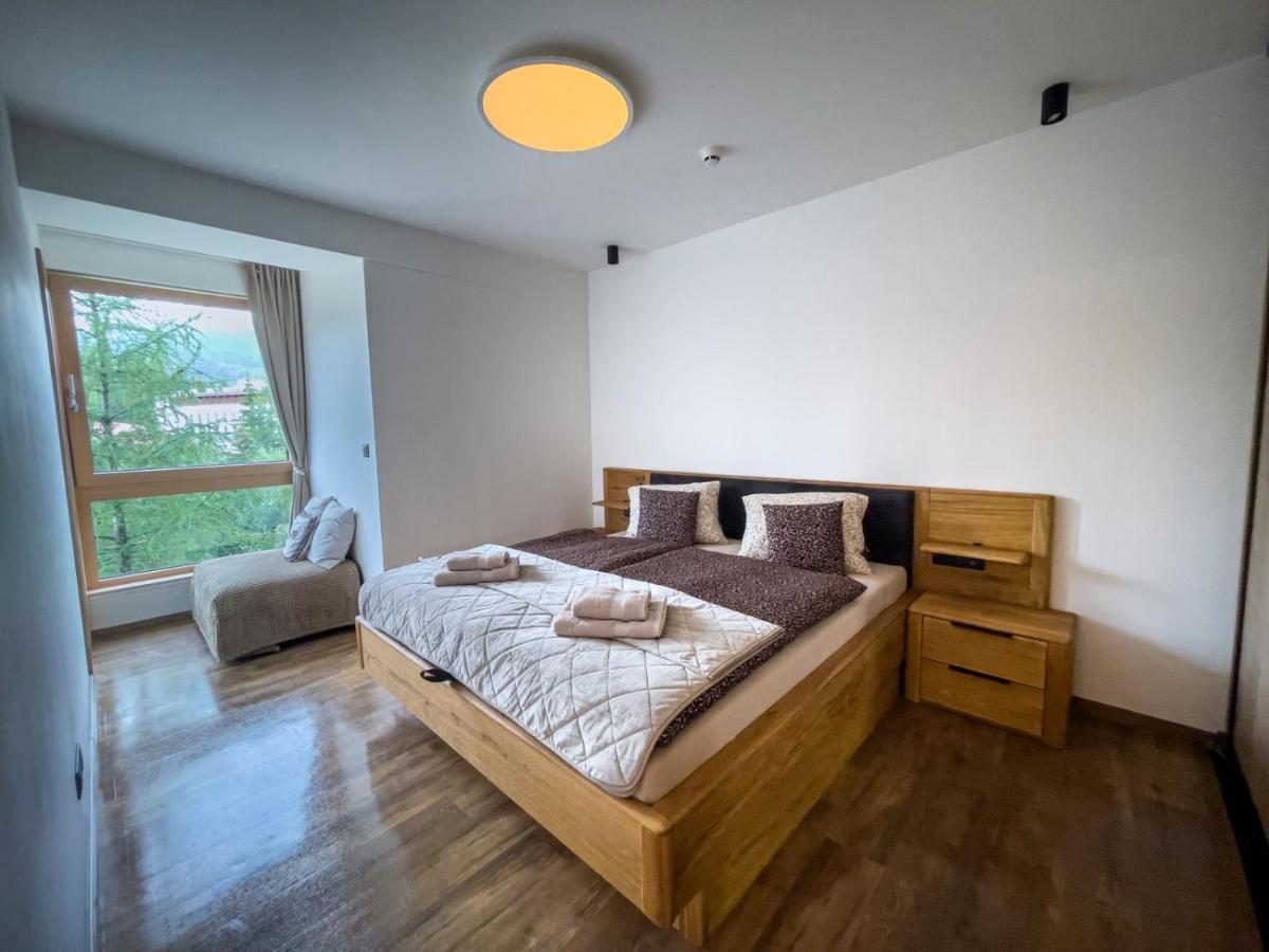 Apartmán s výhľadom na štíty Ovruč 312 Štrbské Pleso Esterno foto